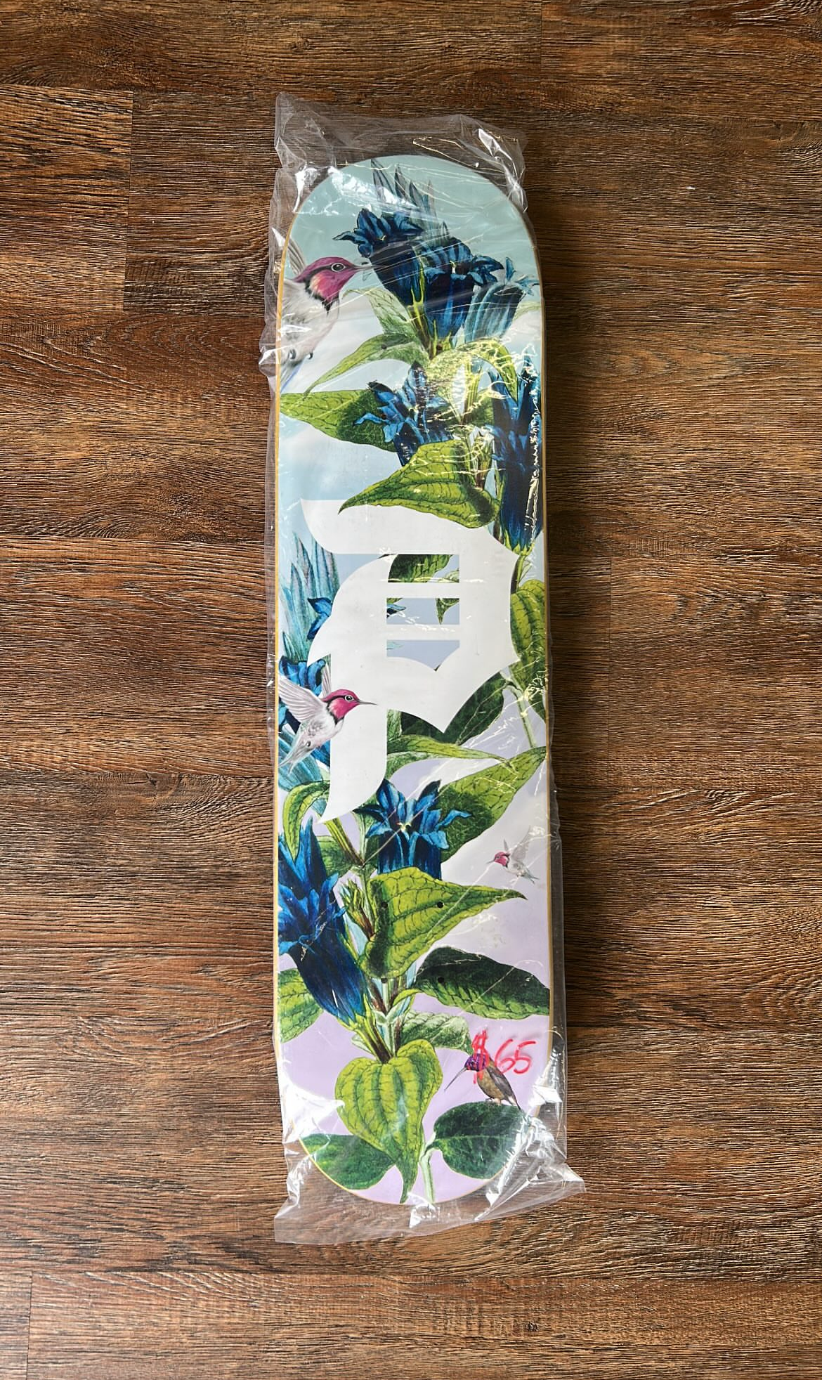 Primitive Dirty P Humming skateboard deck.