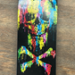 Superior skateboard deck featuring a colorful, dripping skull and crossbones graphic